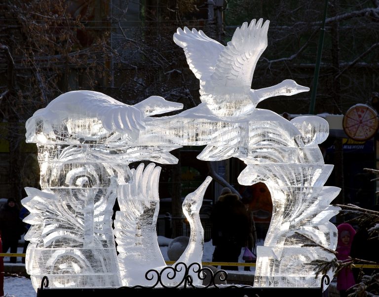 Geese in flight ice sculpture