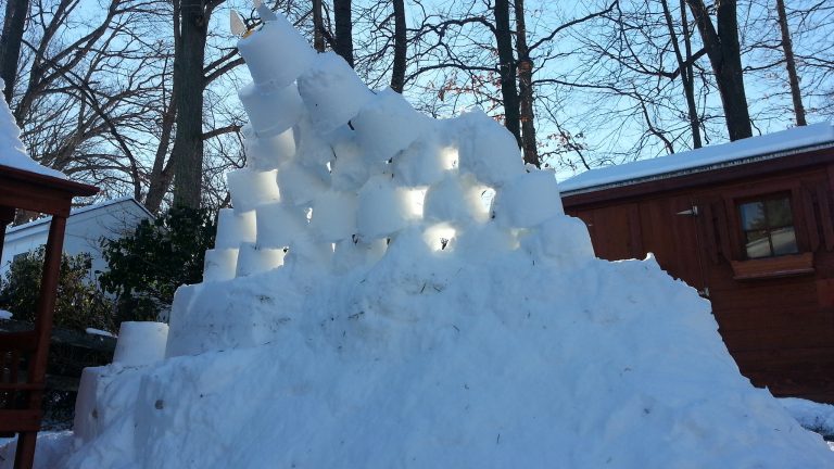 Snow fort built with pales
